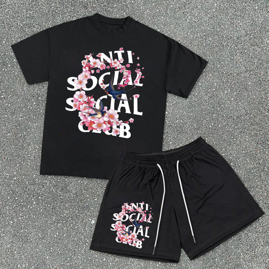 Conjunto de camiseta y pantalones cortos de malla de moda urbana
