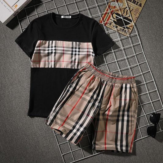 Traje de camiseta de manga corta con pantalones cortos y costuras de tendencia a cuadros callejeros