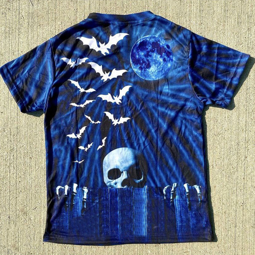 Camiseta de manga corta con estampado de calaveras y estilo urbano llamativo